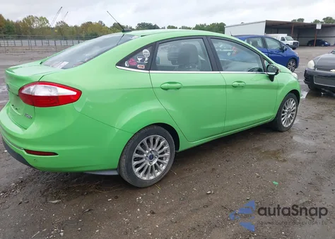 2015 Ford Fiesta Titanium z USA, uszkodzony, nr VIN 3FADP4CJ3FM105751